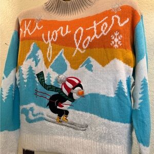 Colorful Ski-Themed Turtleneck Sweater